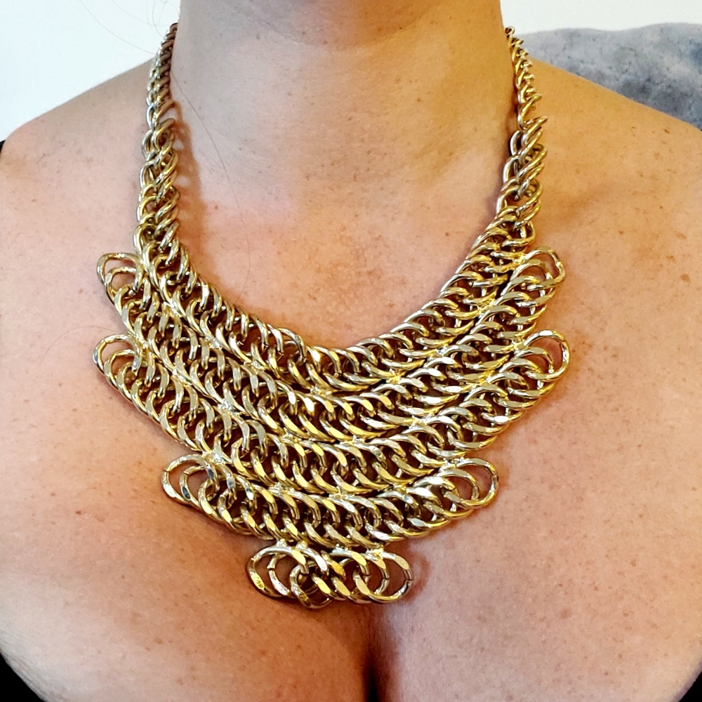 Womans chain link gold necklace.